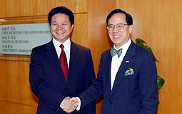 Donald Tsang & Tang Bingquan