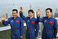 Astronauts wave to people at the Peak 