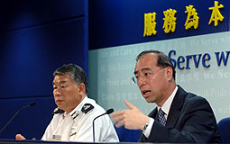 Police Director of Operations Peter Yam and Director of Crime & Security Richard Tang 