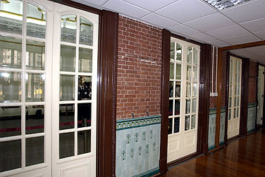 Kom Tong Hall - wooden doors with glass panes