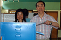 Chief Secretary for Administration Henry Tang & wife