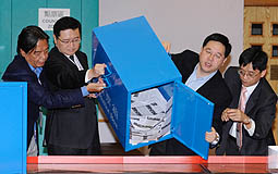 emptying ballot box