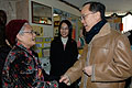 Donald Tsang chats with the aged