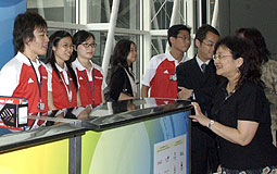 Carrie Yau meets the assistants at the hospitality desks